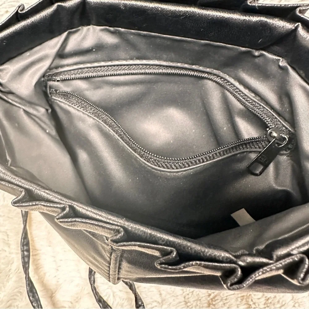 Vintage Chic Black Leather Clutch with strap, Metal inside makes diamond opening